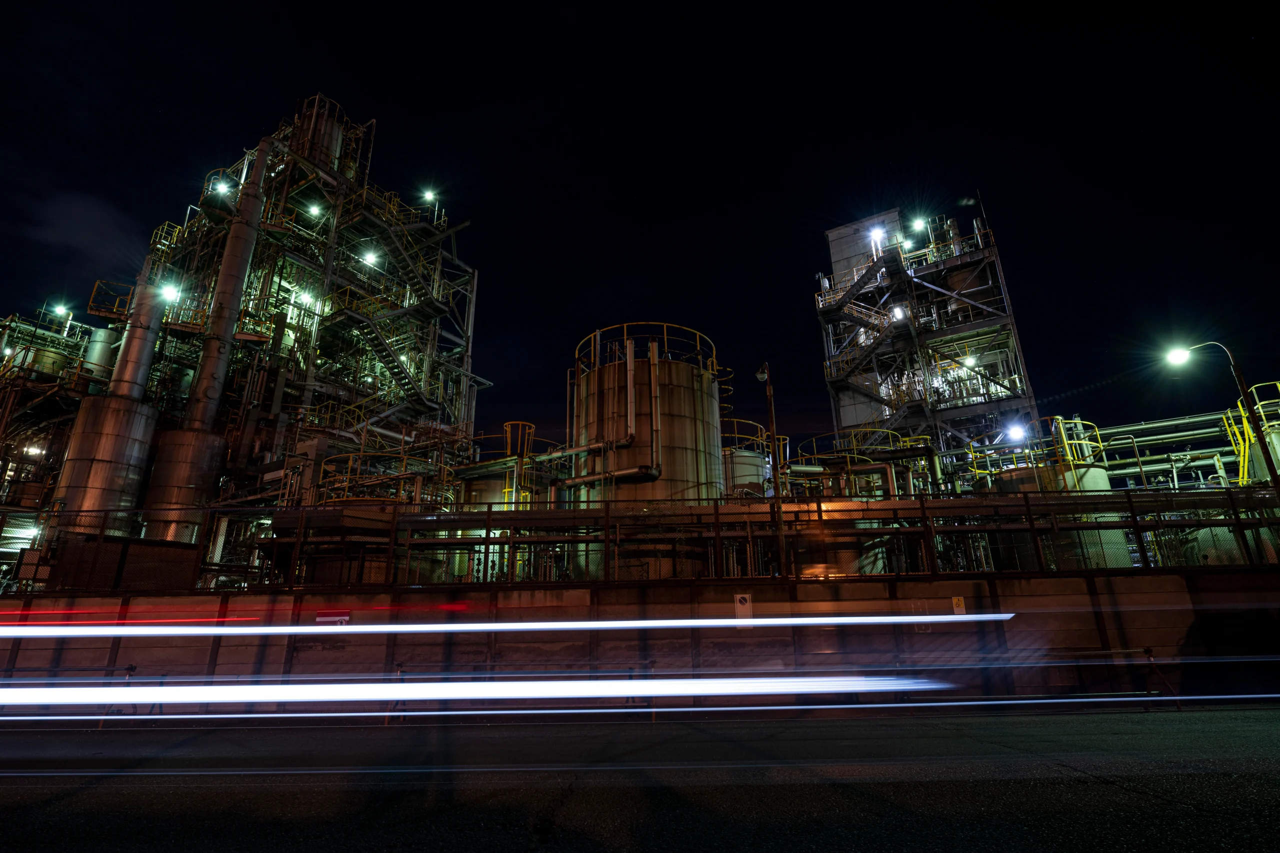 Photo of a construction site at night with low lighting making it dark