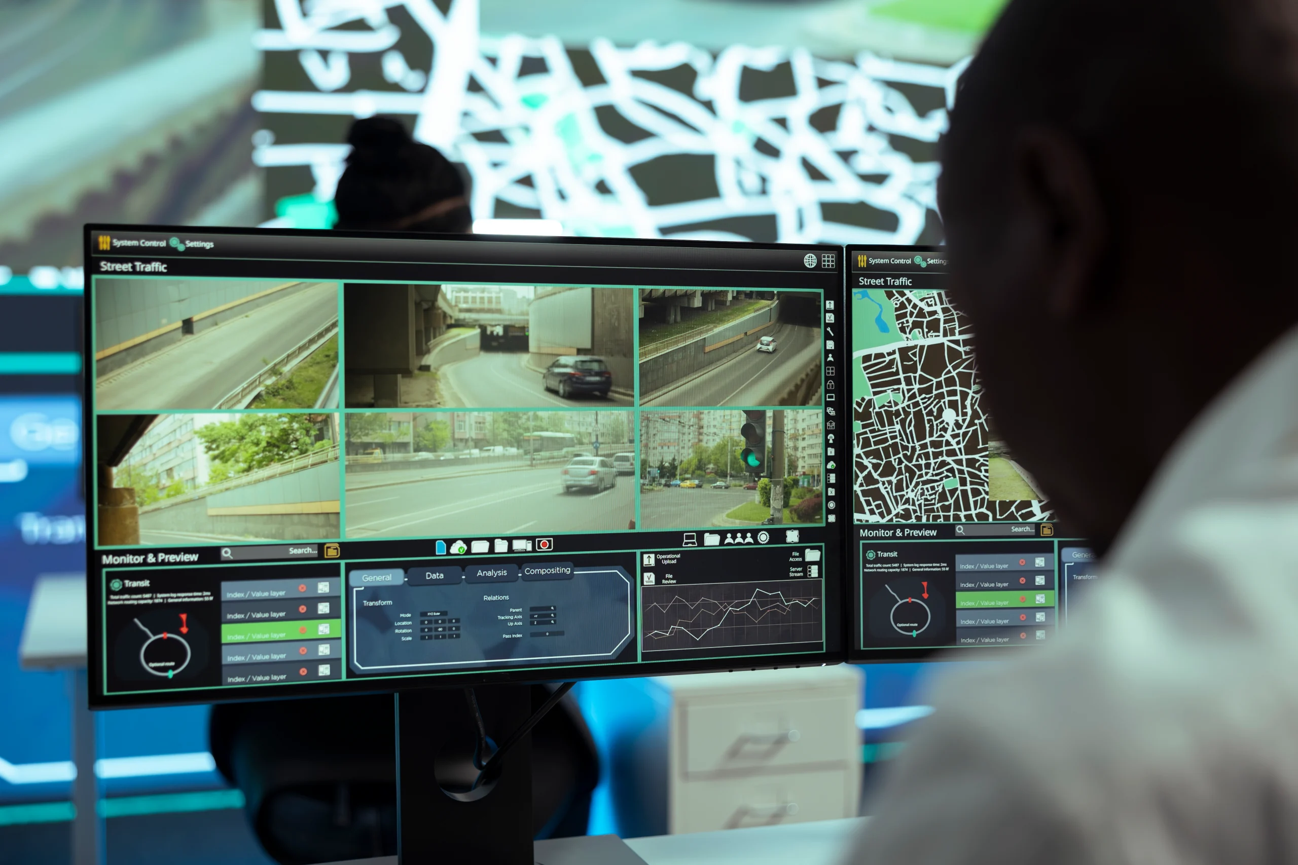 A security set up with an operator observing live footage recorded from surveillance drone